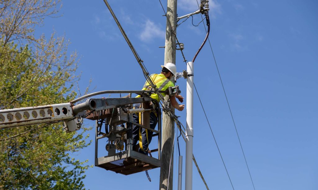Aerial construction and utility pole telecommunications work
